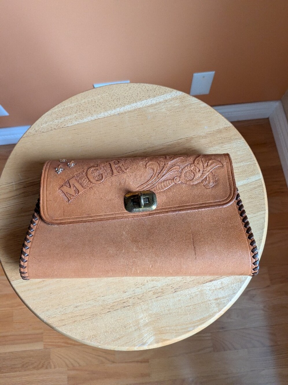 Vintage Hand-Tooled Tan Leather Clutch with Embossed Floral Detail